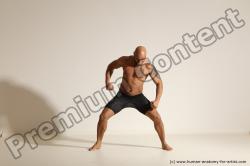 Underwear Gymnastic poses Man Black Muscular Bald Dancing Dynamic poses Academic